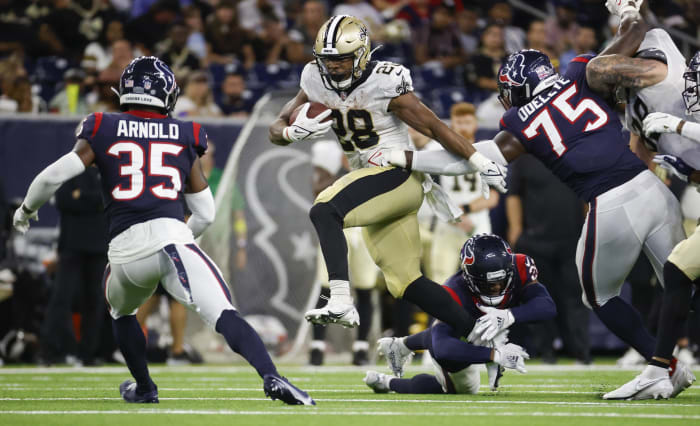 New Orleans Saints running back Devine Ozigbo (28) runs against the Houston Texans. Mandatory Credit: Troy Taormina-USA TODAY Sports